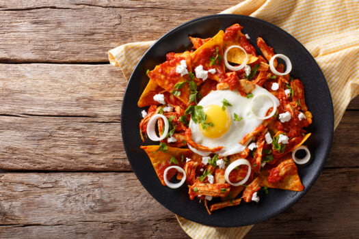 Mexican,Nachos,With,Tomato,Salsa,,Chicken,And,Egg,Close-up,On