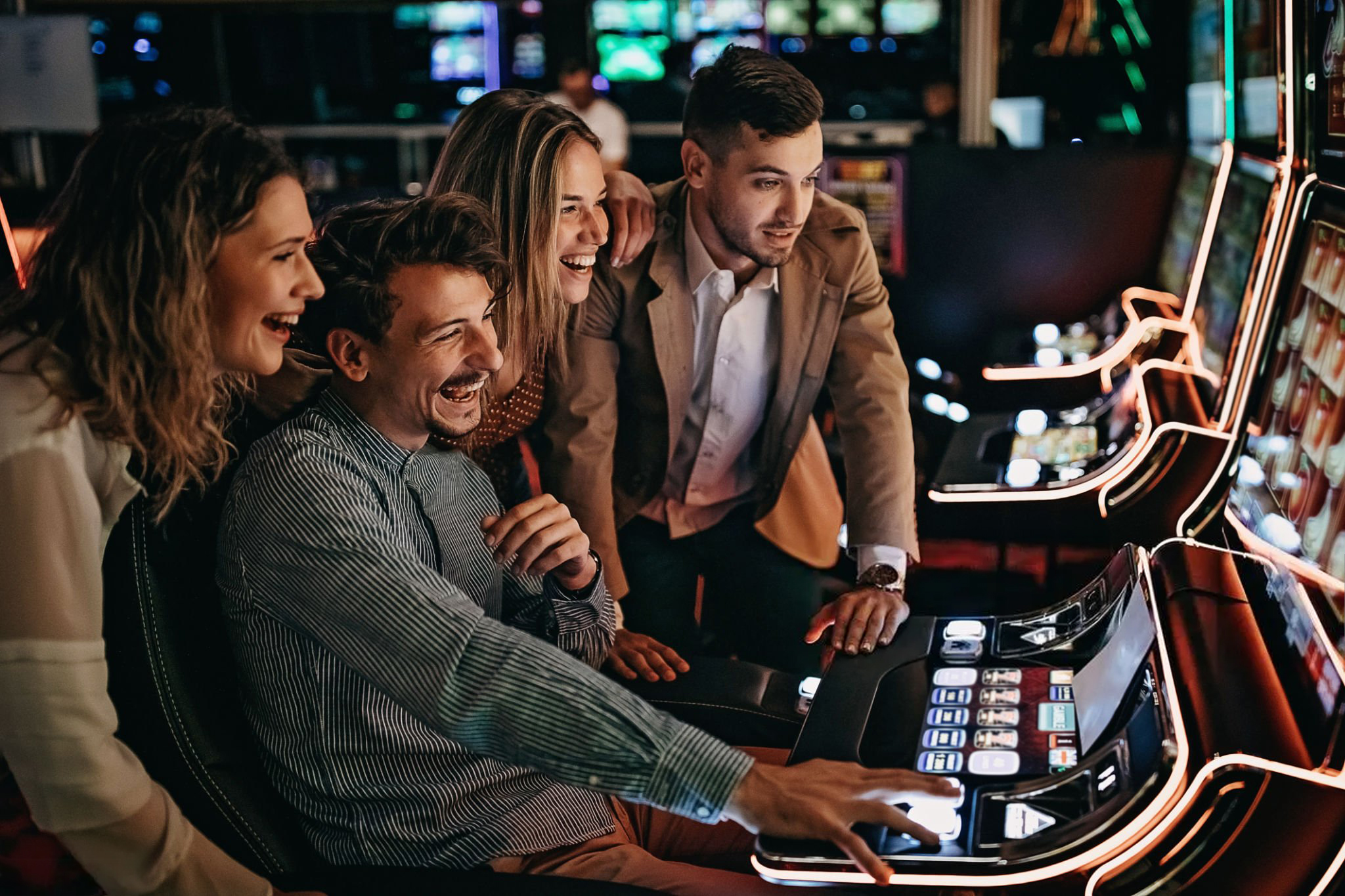 Group of friends gambling in casino